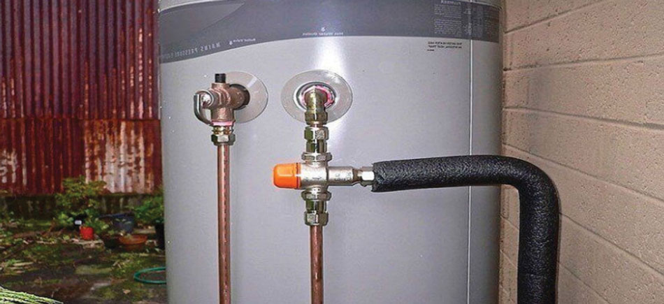 how does hot water plumbing work